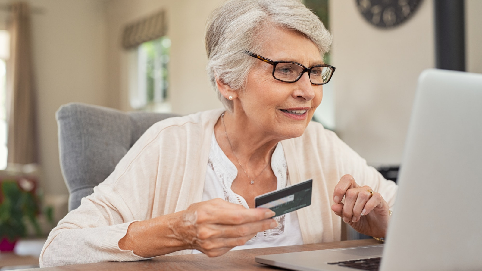 Old woman paying bills online