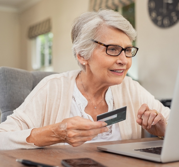 Old woman paying bills online